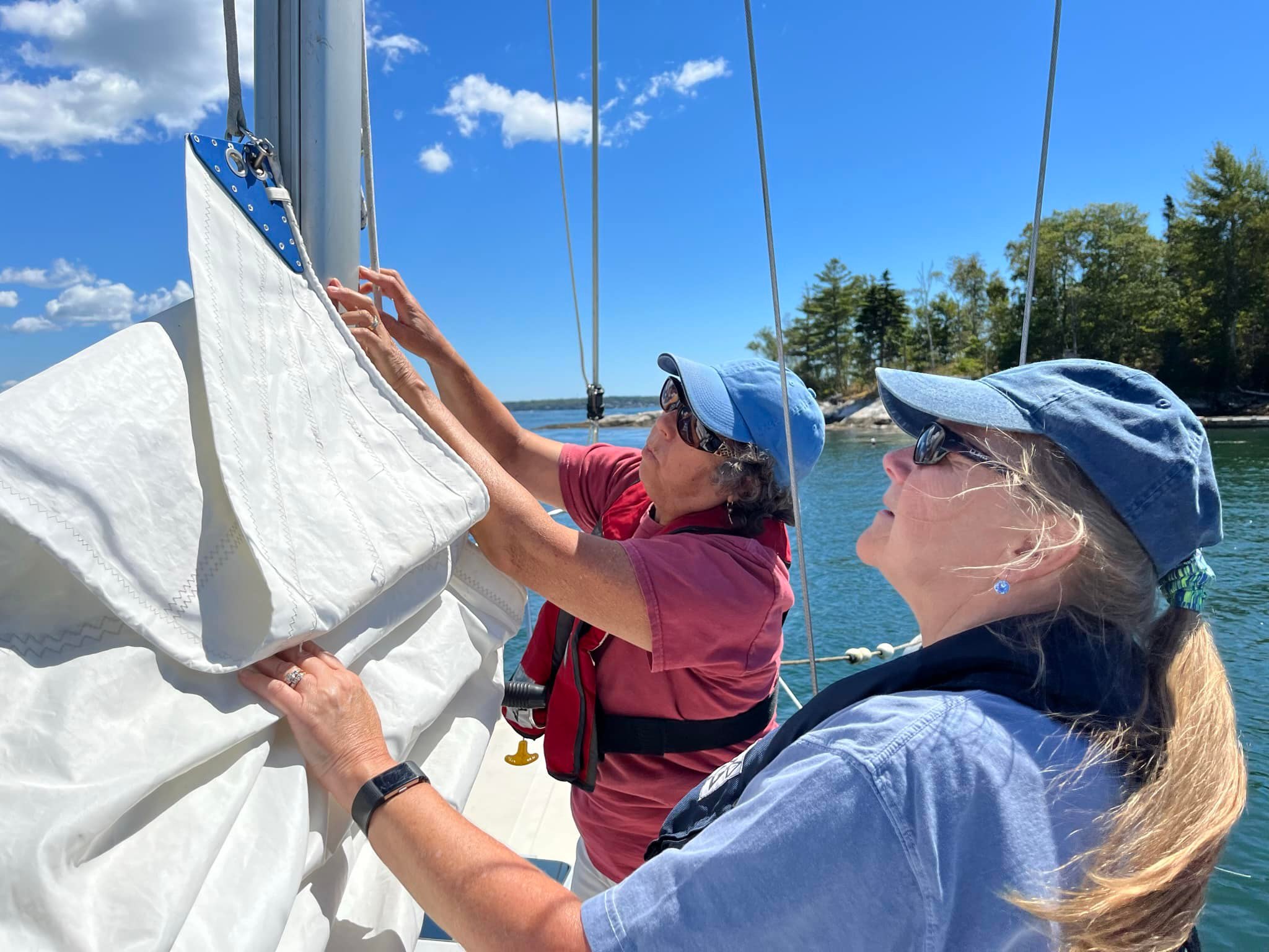 Celeste & Elaine raising sail